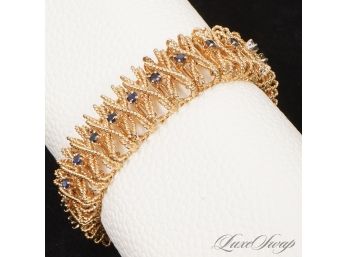 AN EXTRAORDINARY VINTAGE SOLID 14K YELLOW GOLD 52.44 GRAM HIGH DETAIL BRACELET WITH 23 SAPPHIRES