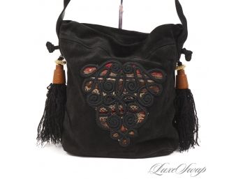 A UNIQUE ANONYMOUS BLACK CHEVRE' SUEDE SLOUCHY HANDBAG WITH SCROLLWORK EMBROIDERY AND TASSLE CINCH PULLS