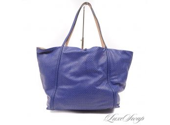 MODERN AND LIKE NEW ARMANI EXCHANGE ROYAL BLUE NUDE LINED PERFORATED SLOUCHY TOTE BAG