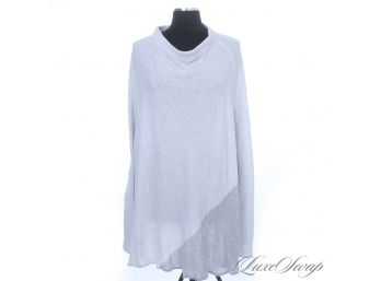 WEAR THIS WHEN YOU GO..... EVERYWHERE! I CANT MAKE OUT THE NAME ON THE TAG LOL BUT ITS A SOFT GREY CAPE PONCHO