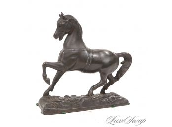 ONE QUALITY CAST METAL 8.5' TALL BLACKENED STATUE OF A HORSE WITH ONE FOOT ASTRIDE