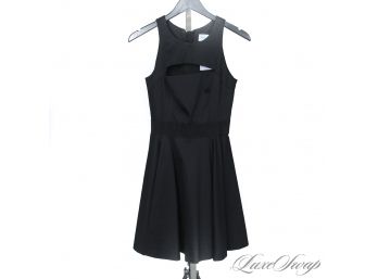 DANG THESE ARE EXPENSIVE : LIKE NEW MILLY MADE IN USA BLACK STRETCH DRESS WITH FLOUNCE HEM AND BUST CUTOUT