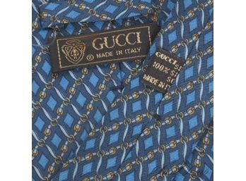 AUTHENTIC GUCCI MADE IN ITALY MENS NAVY BLUE SILK TIE WITH GOLD CHAINLINK LATTICE PRINT