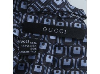 #6 AUTHENTIC AND LIKE NEW GUCCI MADE IN ITALY MENS SILK TIE IN MIDNIGHT GROUND AND RADIANT CUBE MOD MOTIF