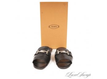 TODS MADE IN ITALY BLACK LEATHER FLAT SLIDES WITH SILVER BUCKLE  ORIGINAL BOX 38