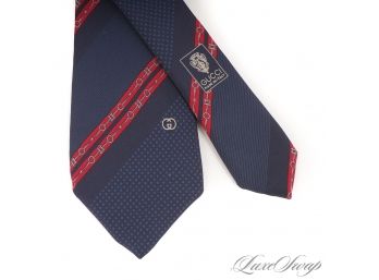 THIS IS A GREAT ONE : VINTAGE GUCCI MADE IN ITALY MENS SILK TIE IN NAVY BLUE WITH RED DOUBLE HORSEBIT STRIPE