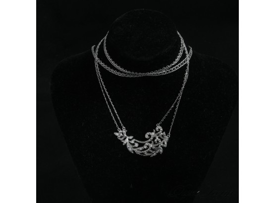 ONE BEAUTIFUL SILVER TONE NECKLACE WITH FILAGREE CARVED CORNUCOPIA AND CRYSTALS AND A BACK DROP