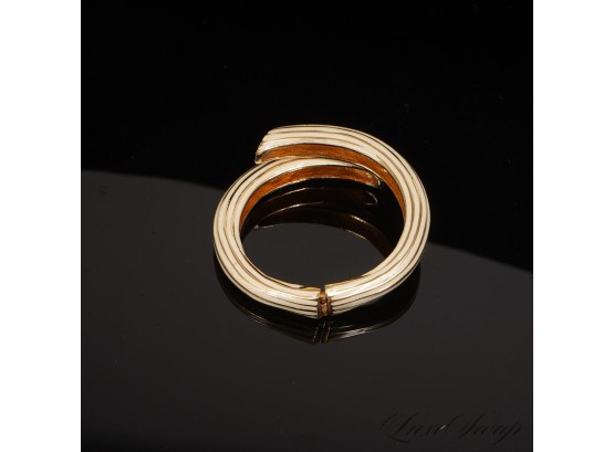 #1 A RECENT AND HIGH QUALITY ANONYMOUS GOLD TONE AND IVORY ENAMEL FLEX HINGE CUFF BRACELET