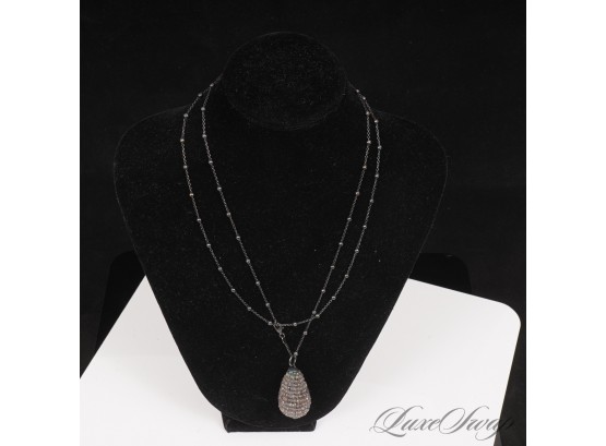 #8 A BEAUTIFUL AND GOOD QUALITY GUNMETAL BEEHIVE SHAPED PENDANT ON A BEADED STRAND LONG NECKLACE