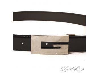 INCREDIBLE: TOM FORD ERA AUTHENTIC GUCCI MADE IN ITALY BLACK/BROWN REVERSIBLE BELT W/ LARGE SILVER G BUCKLE 44