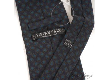 AUTHENTIC TIFFANY & CO. MADE IN ITALY MENS SILK TIE IN MUTED MIDNIGHT BLUE AND FLORAL MOSAIC PRINT