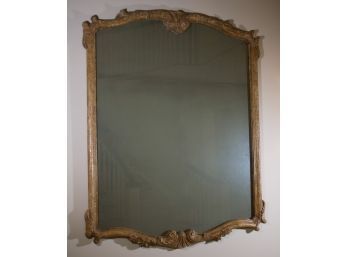 Monumental French Provincial-style Antiqued Carved Wood Smoked Mirror