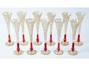 Eleven (11) Art Glass Ruby Red & Gilt Champagne Flutes