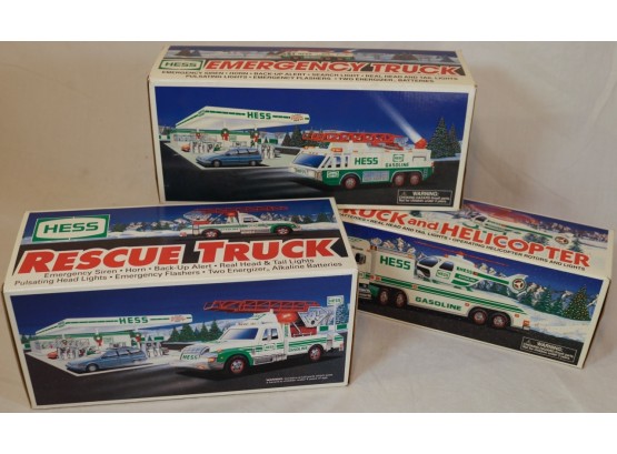 Three (3) Hess Trucks