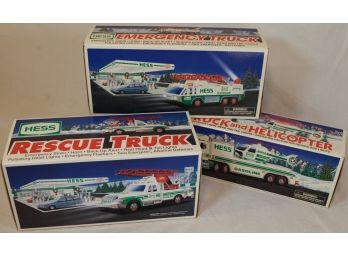Three (3) Hess Trucks