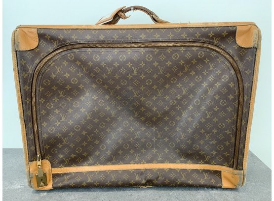 Past auction: Three pieces of vintage soft side luggage, Louis Vuitton