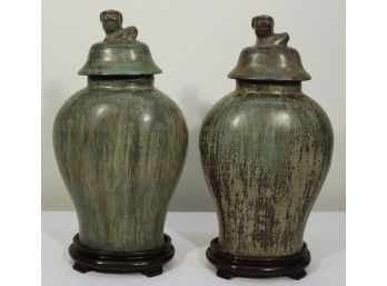 Pair Of Bronze Lidded Urns With Foo Dog Finials