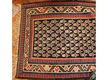 An Early 20th Century Iranian Hand Knotted Wool Runner Rug