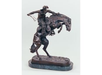 A Bronze Sculpture 'Bronco Buster'  After Frederic Remington