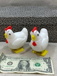 Two Chicken Pooping Candy Dispensers