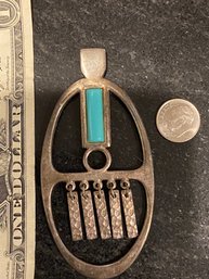 Sliver And Turquoise Pendant.