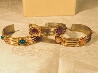 3 Silver And Brass Bangles With Stones
