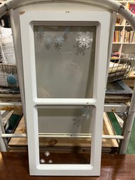 Small Window With Snowflake Decor