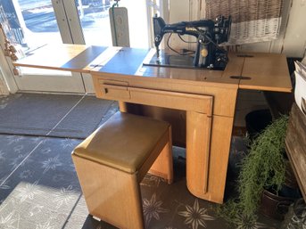 Singer Sewing Machine With MCM Wood Table And Stool.