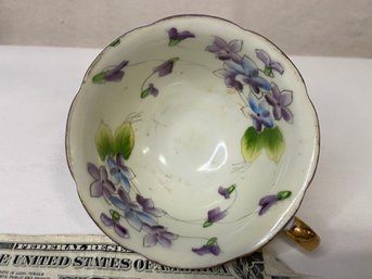 Antique Teacup With Violets