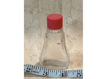 Vintage Bottle With Red Top