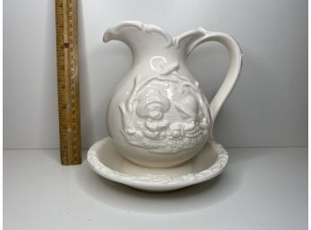 Vintage Embossed Pitcher And Saucer