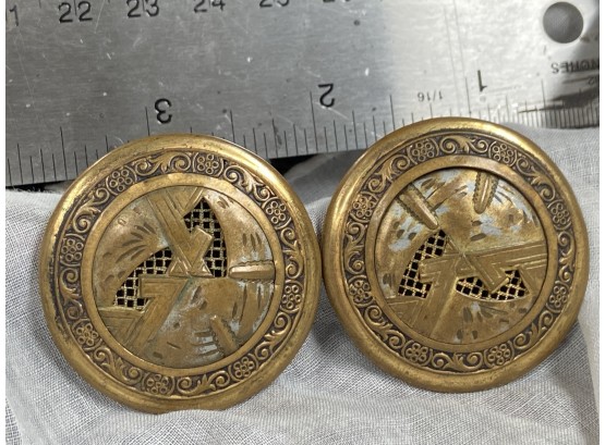 Two 'brass' Buttons