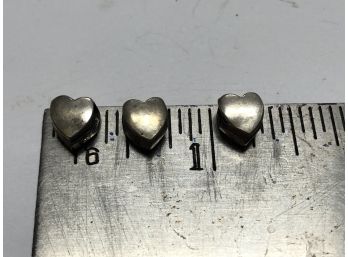Three Sterling Silver Beads