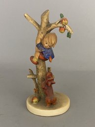 Goebel Hummel Figurine Of A Boy Climbing A Tree