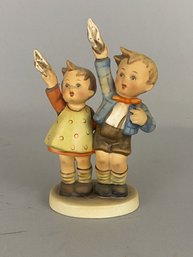Goebel Hummel Figurine Of A Boy And A Girl Waiving With Handkerchiefs