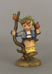 Goebel Hummel Figurine Of A Boy Sitting In An Apple Tree