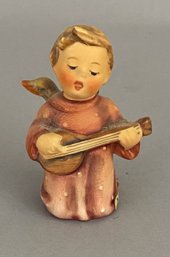 Goebel Hummel Figurine Of A Child With Wings Playing A Lute