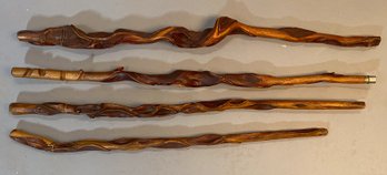 Four Hand Carved Root Canes