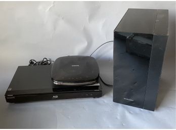 Sony Blue Ray Player, Samsung CD Player And Samsung Speaker