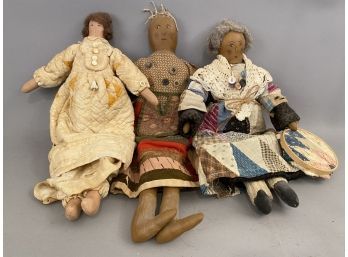 Three Painted Oil Cloth Dolls With Quilt Dresses