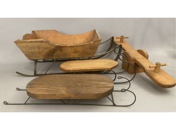 Four Handmade Childrens Toys Including Sleigh, Two Sleds And A Seesaw