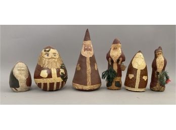 Six Hand Made Oil Cloth Santa Claus Figures