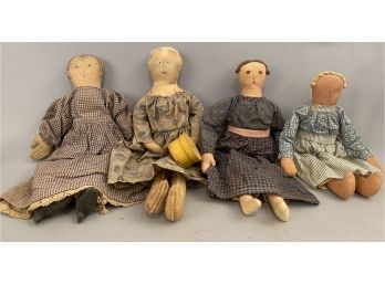 Four Hand Crafted Cloth Rag Dolls One Holding