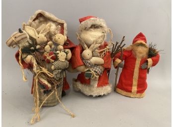 Three Handcrafted Santa Claus Figures One With Toy Bag Stuffed