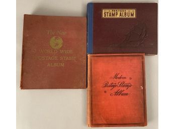Three Postage Stamp Albums 330 Stamps