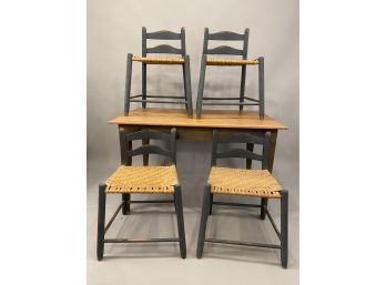 Country Style Table With Four Low Ladder Back Side Chairs