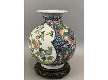 Chinese Style Porcelain Vase With Butterfly And Floral Design