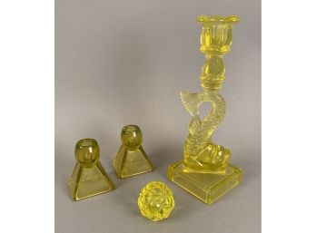 Four Vaseline Glass Candle Sticks Including Dolphin