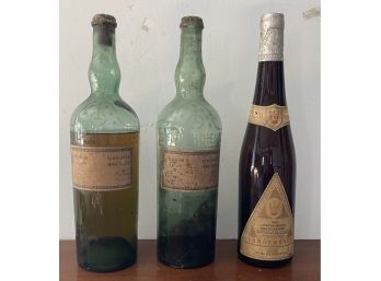 Three Vintage Wine Bottles