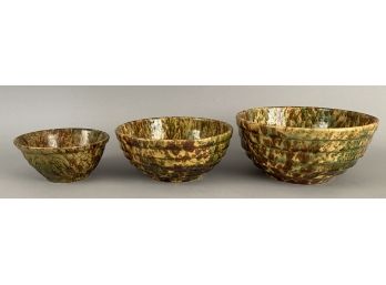 Three Rockingham Bowls With Mottled Green Glaze
